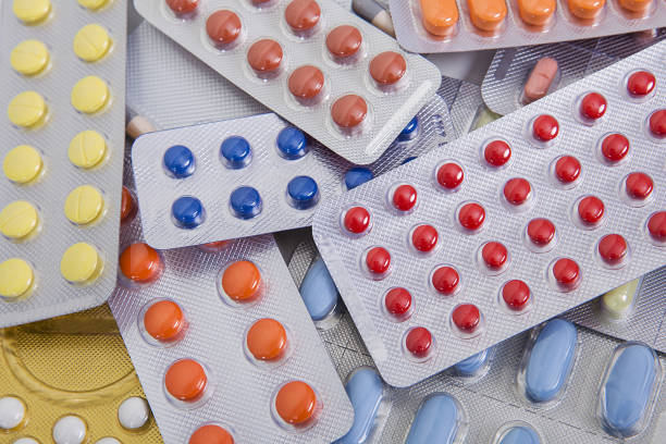 istock Pile of many different pills. 1203903330