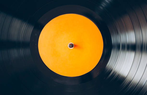 istock Close up of turntable playing vinyl record 1203904086