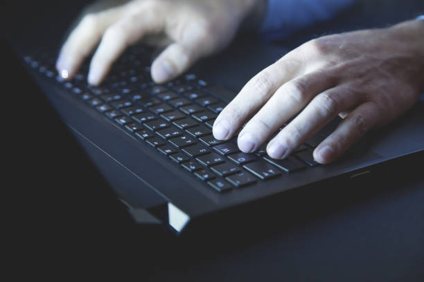 istock Male hands typing on laptop keyboard. Technology. Business 1203905454