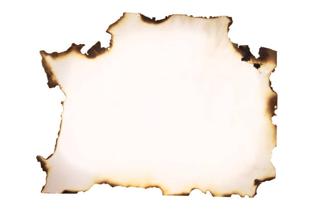 istock white sheet of paper burned at the edges 1203905917