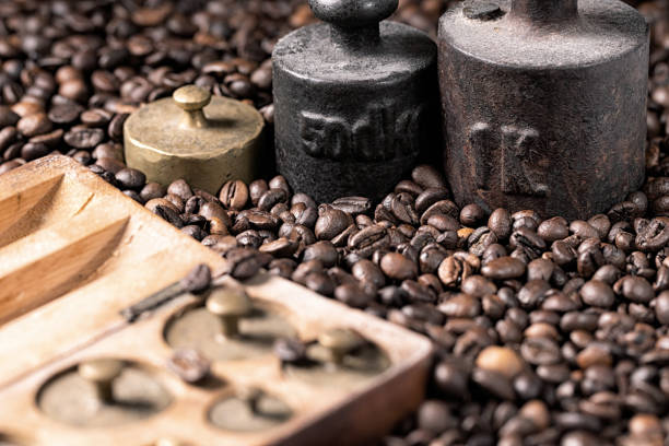 istock metal weights and coffee beans 1203911103
