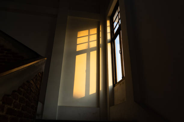 Sunlight from a window in a dark room