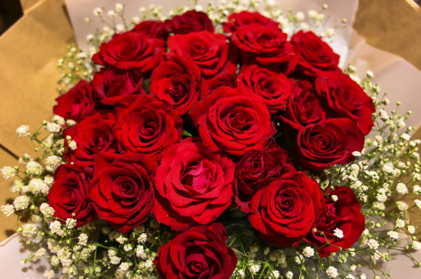 istock Red rose bouquet for marriage proposal or Valentine's Day gift. 1203914792