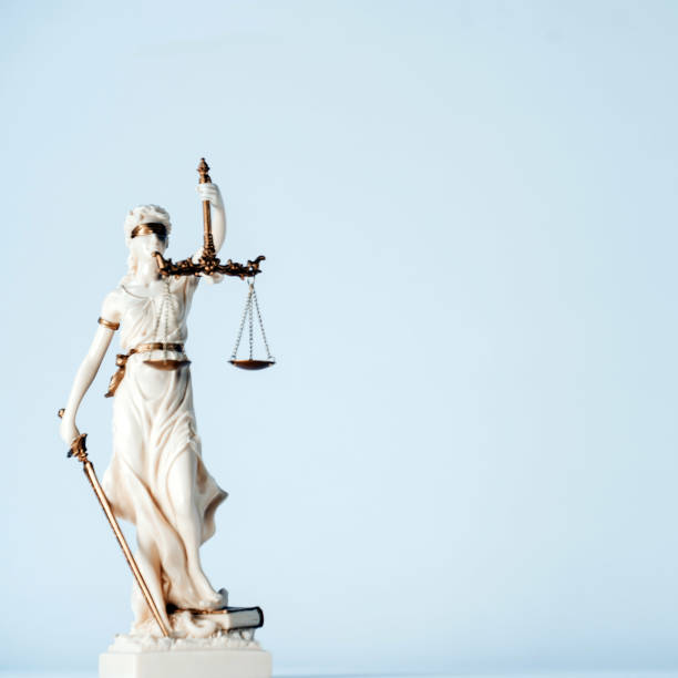 istock Statue of Themis on a white background, justice 1203916963