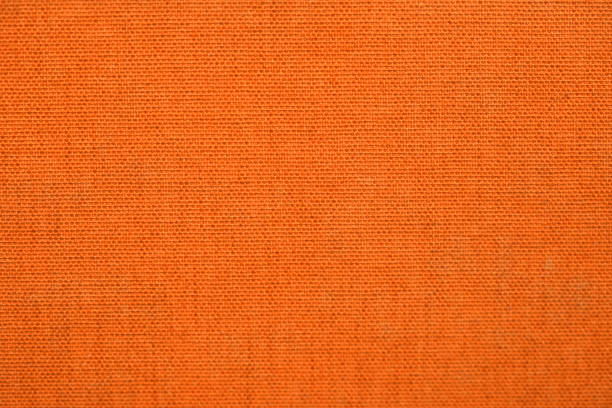 Orange linen book cover Orange color book cover pattern hessian texture stock pictures, royalty-free photos & images