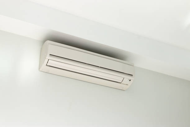 istock Air conditioning Installed on a white concrete wall in the house. 1203920104