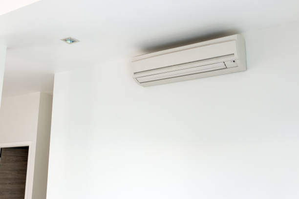 istock Air conditioning Installed on a white concrete wall in the house. 1203920120