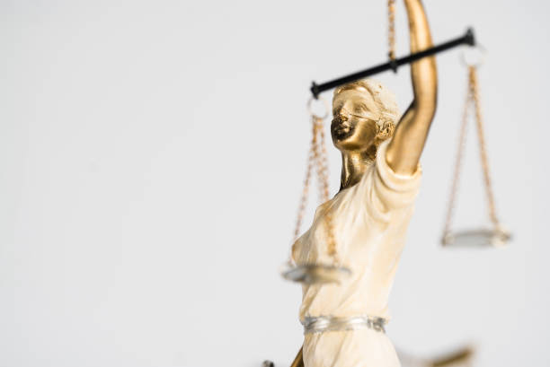 istock Statue of Themis on a white background, justice 1203920365