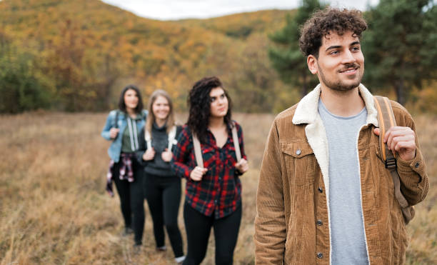 istock Friends on mountain hiking 1203921409
