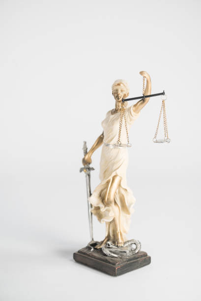 istock Statue of Themis on a white background, justice 1203921629