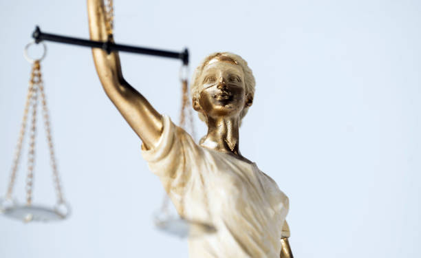 istock Statue of Themis on a white background, justice 1203921744
