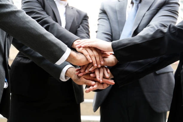 istock Young business partner handshake concept. 1203921876