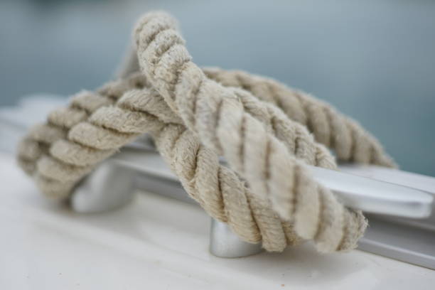 istock Sail boat docking line on mooring cleat 1203922896