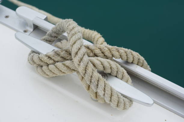 istock Sail boat docking line on mooring cleat 1203922910