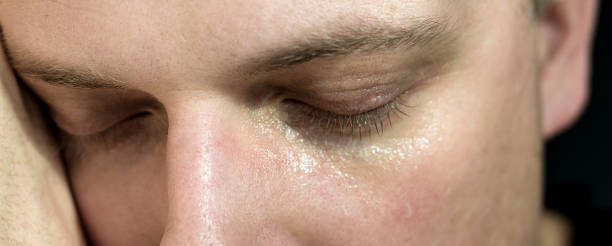 istock Sensitive portrait of a vulnerable young man 1203926861