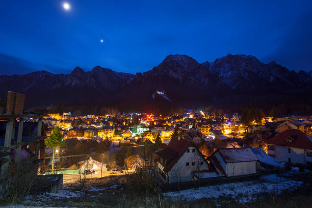 istock Busteni city at night. Romania 1203929653