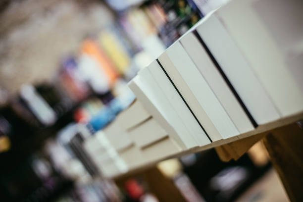 istock Stack of books at a charity book flea market, text space 1203931245