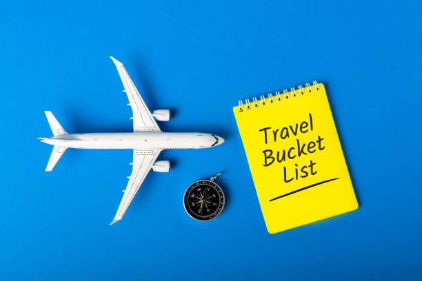 travel bucket list on blue background with compas and toy airplane. trip travel destination and most visited places - japan map tokyo prefecture world map imagens e fotografias de stock