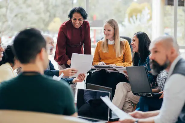 Photo of Diverse Group in a Successful Business Meeting