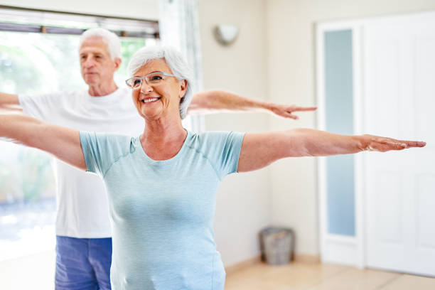 istock Doing a few stretches to keep their bodies strong 1203934013