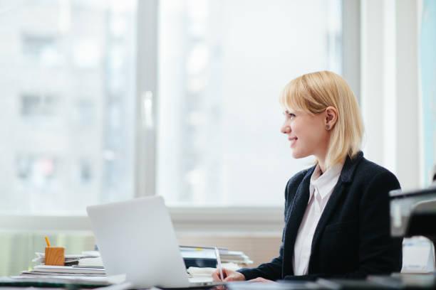 istock Woman in office 1203934120