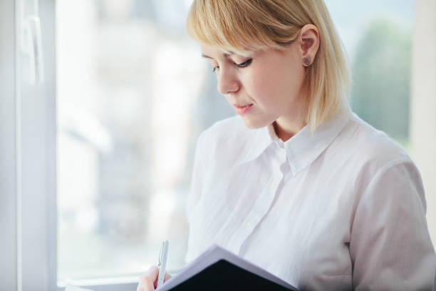 istock Woman in office 1203934122