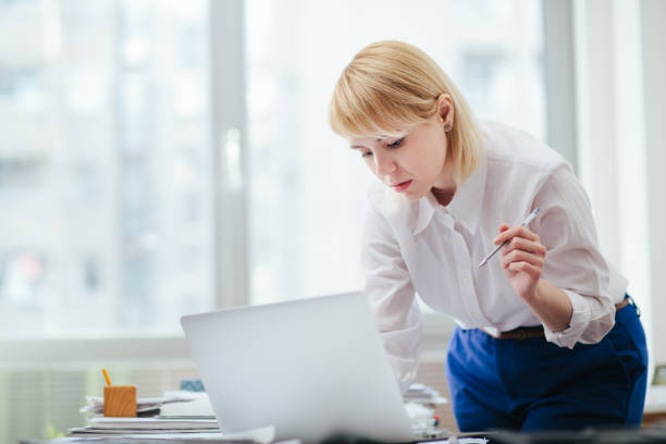 istock Woman in office 1203934123