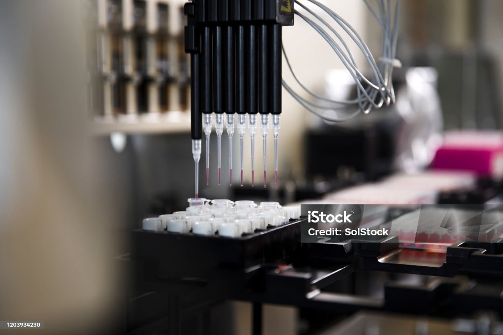 Genomic Laboratory Equipment Close up of genomic sampling machine in laboratory. Genomics Stock Photo