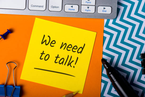 istock We need to talk. Note on workplace. notification of a serious conversation 1203937293