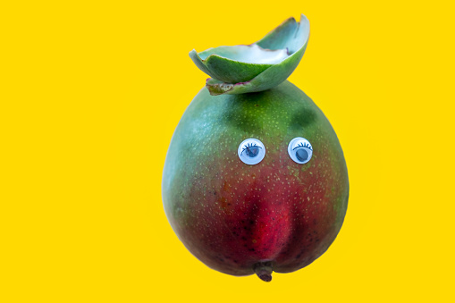 Mango Fruit With Funny Face Stock Photo - Download Image Now -  Anthropomorphic, Anthropomorphic Face, Copy Space - iStock