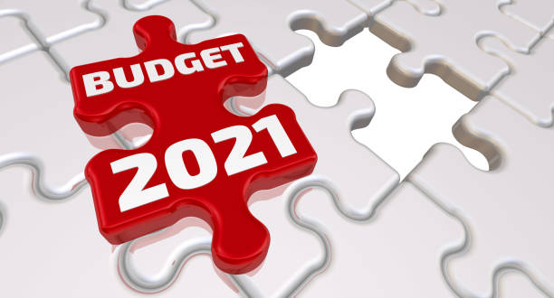 The budget of 2021. The inscription on the missing element of the puzzle stock photo