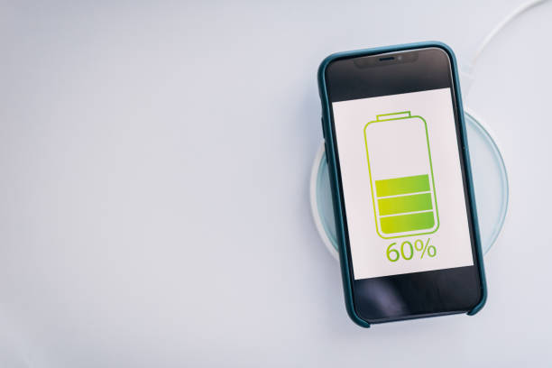 istock Smart phone charging on wireless phone charger 1203941742