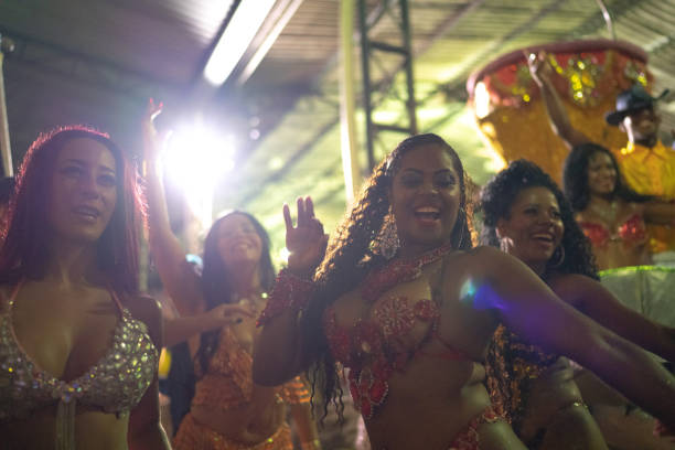istock People celebrating and dancing brazilian carnival 1203942536
