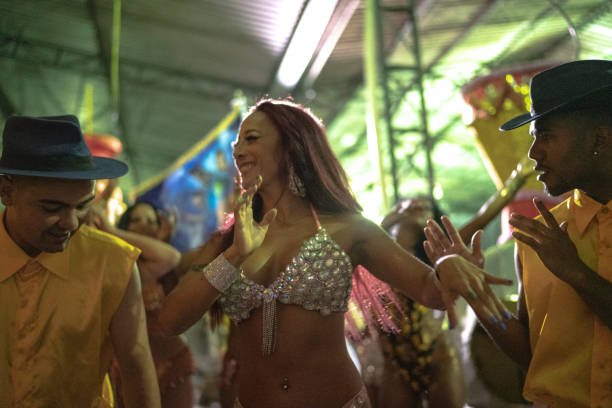 istock People celebrating and dancing brazilian carnival 1203944434