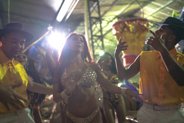 istock People celebrating and dancing brazilian carnival 1203945046
