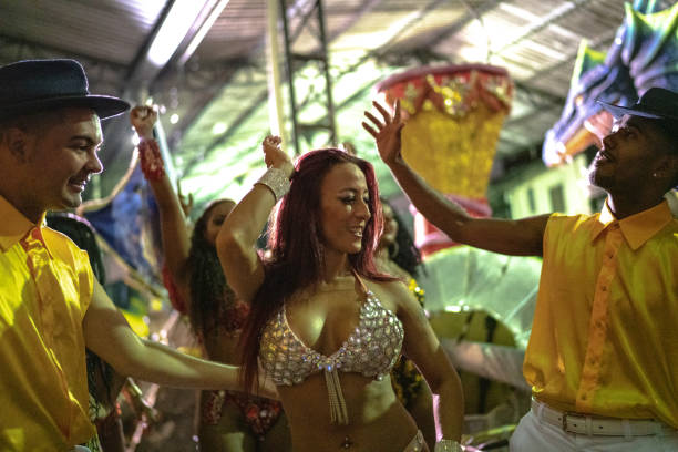 istock People celebrating and dancing brazilian carnival 1203945129