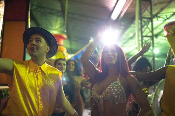 istock People celebrating and dancing brazilian carnival 1203945442