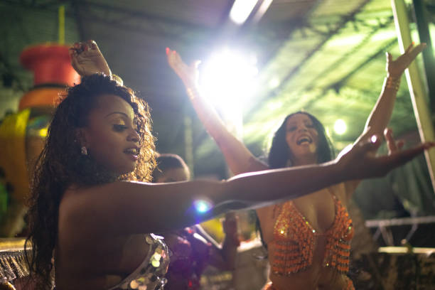 istock People celebrating and dancing brazilian carnival 1203946074