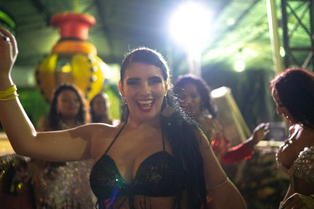 istock People celebrating and dancing brazilian carnival 1203947166
