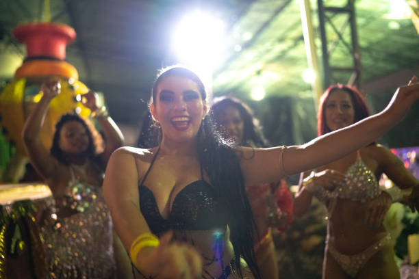 istock People celebrating and dancing brazilian carnival 1203947225