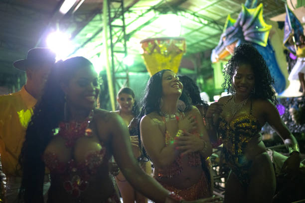 istock People celebrating and dancing brazilian carnival 1203947501