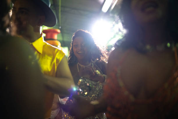 People celebrating and dancing brazilian carnival