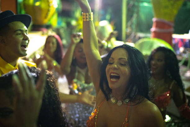 istock People celebrating and dancing brazilian carnival 1203948464