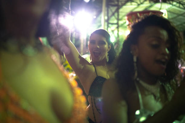 istock People celebrating and dancing brazilian carnival 1203949729