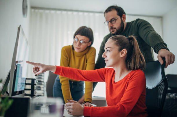 istock Group of tree people in the office working 1203950047