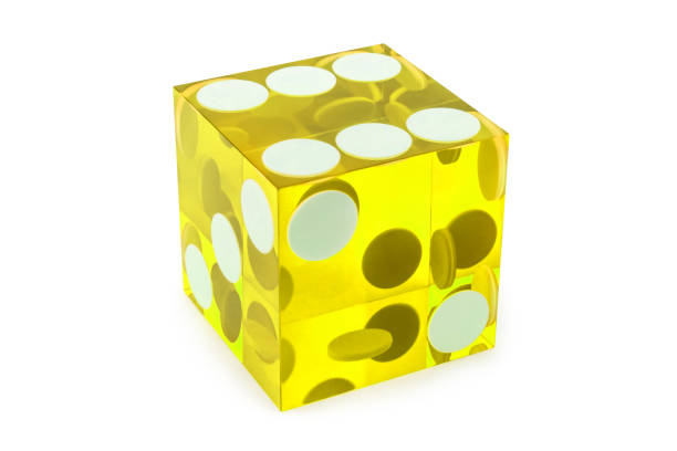 istock Macro yellow dice isolated on white / result as six on top with a light shadow 1203950271