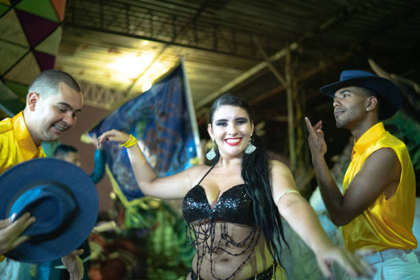 istock People celebrating and dancing brazilian carnival 1203950303