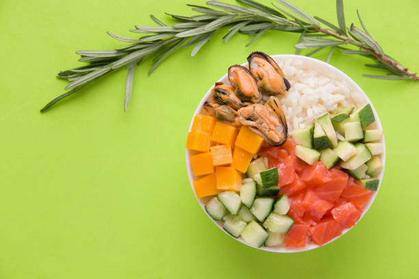 istock Hawaiian poke salad on green background 1203950642