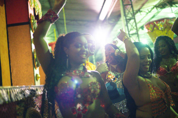 People celebrating and dancing brazilian carnival