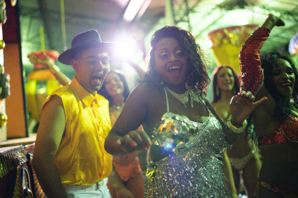 istock People celebrating and dancing brazilian carnival 1203954812
